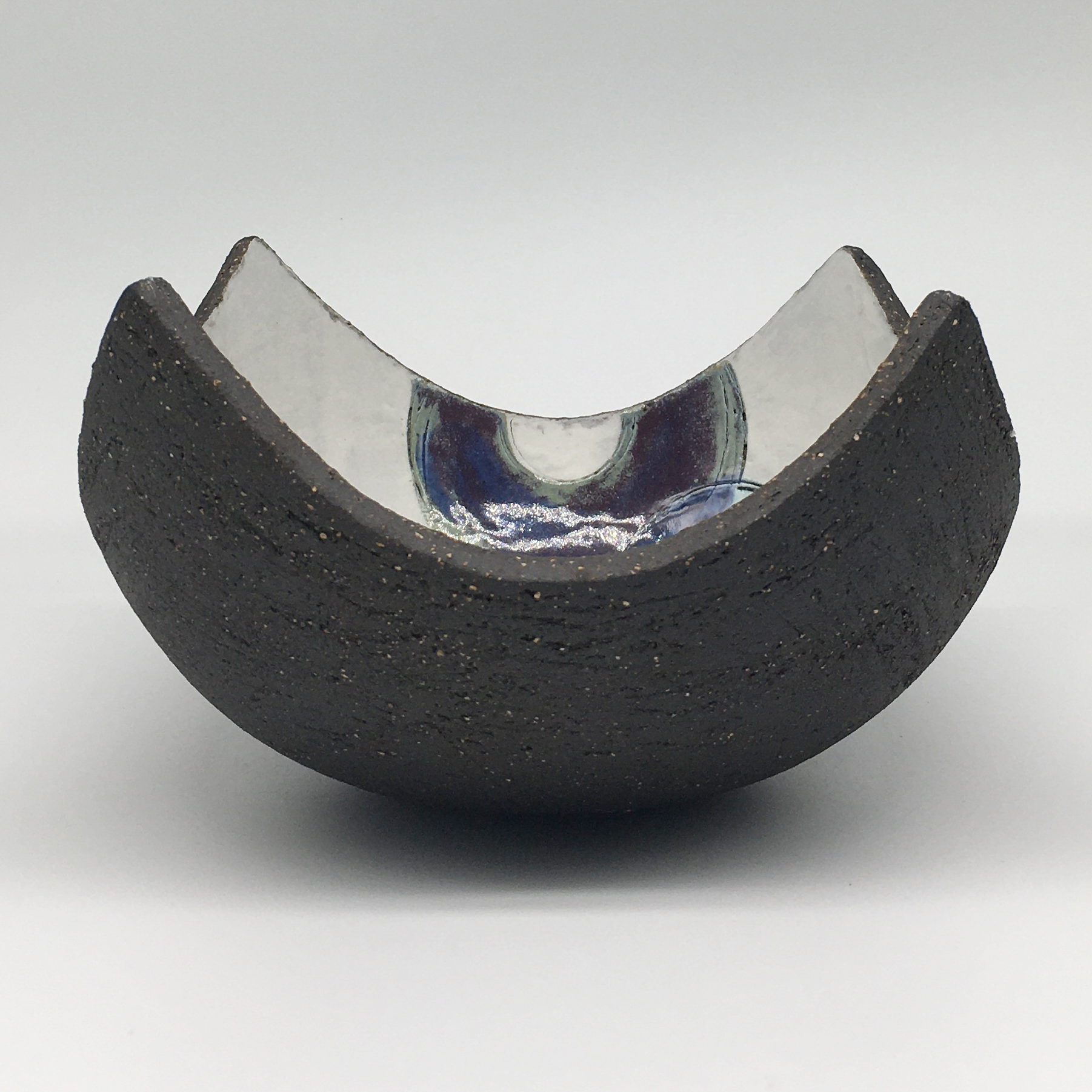 Bowl - Textured black with many blue circles and purple crescents
