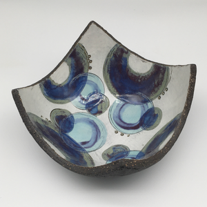 Bowl - Textured black with many blue circles and purple crescents