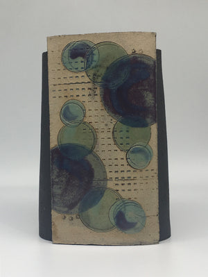 Medium Wrap Pot be- Textured black with muted purple blue circles and dots