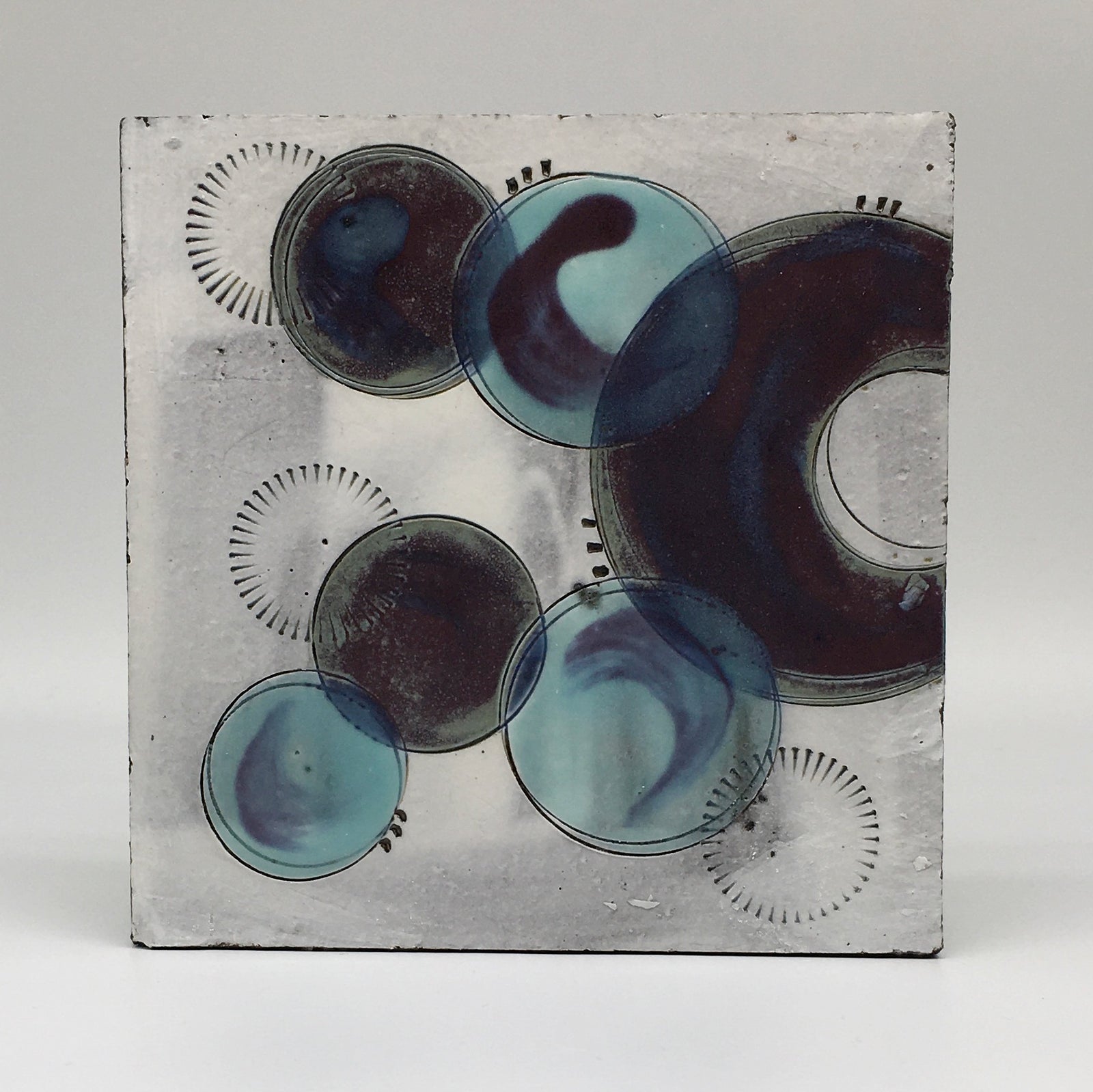 Small wall plaque - with purple crescents and turquoise spots