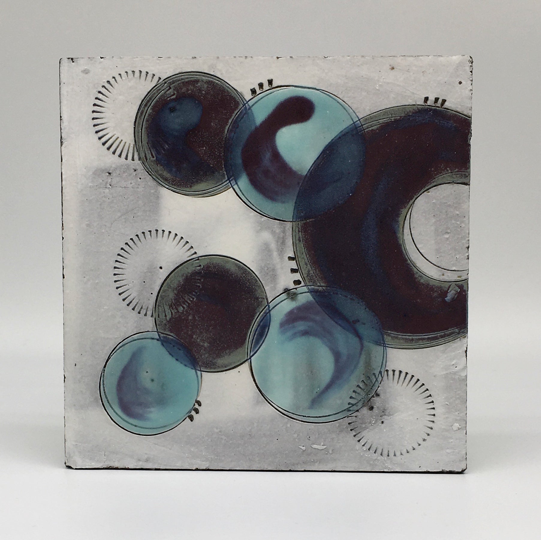 Small wall plaque - with purple crescents and turquoise spots