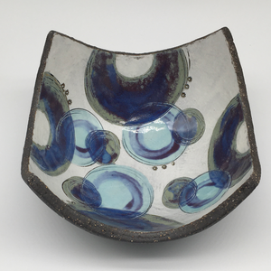 Bowl - Textured black with many blue circles and purple crescents