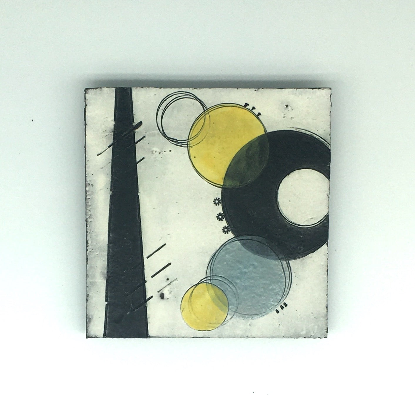 Small wall plaque - bold black line and crescent and vibrant yellow spots